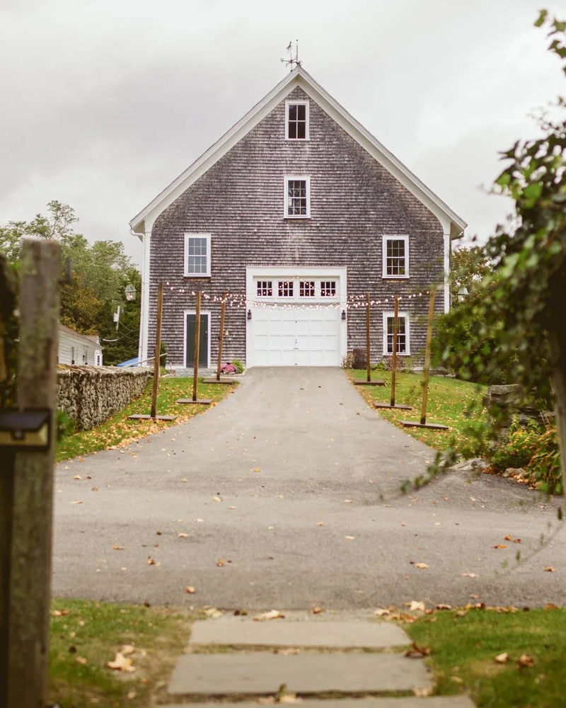 The restored barn and tented lawn at Mount Hope Farm, Bristol, RI