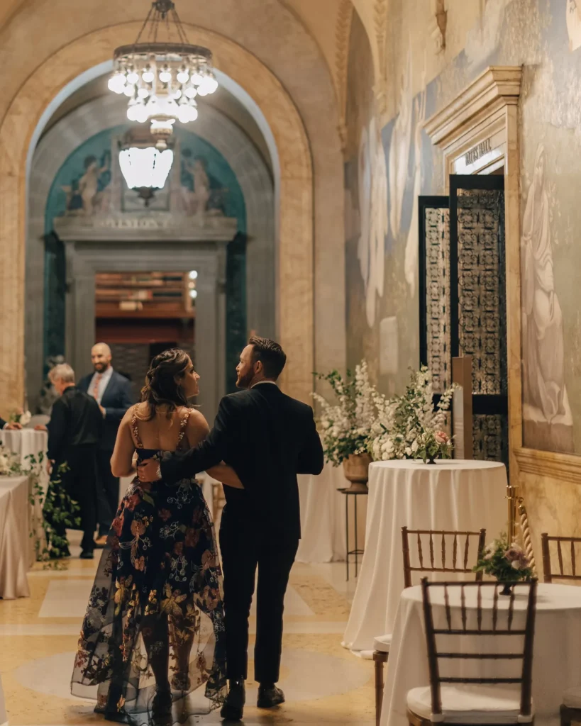 Guests arrive through the ornate entrance of the Boston Public Library