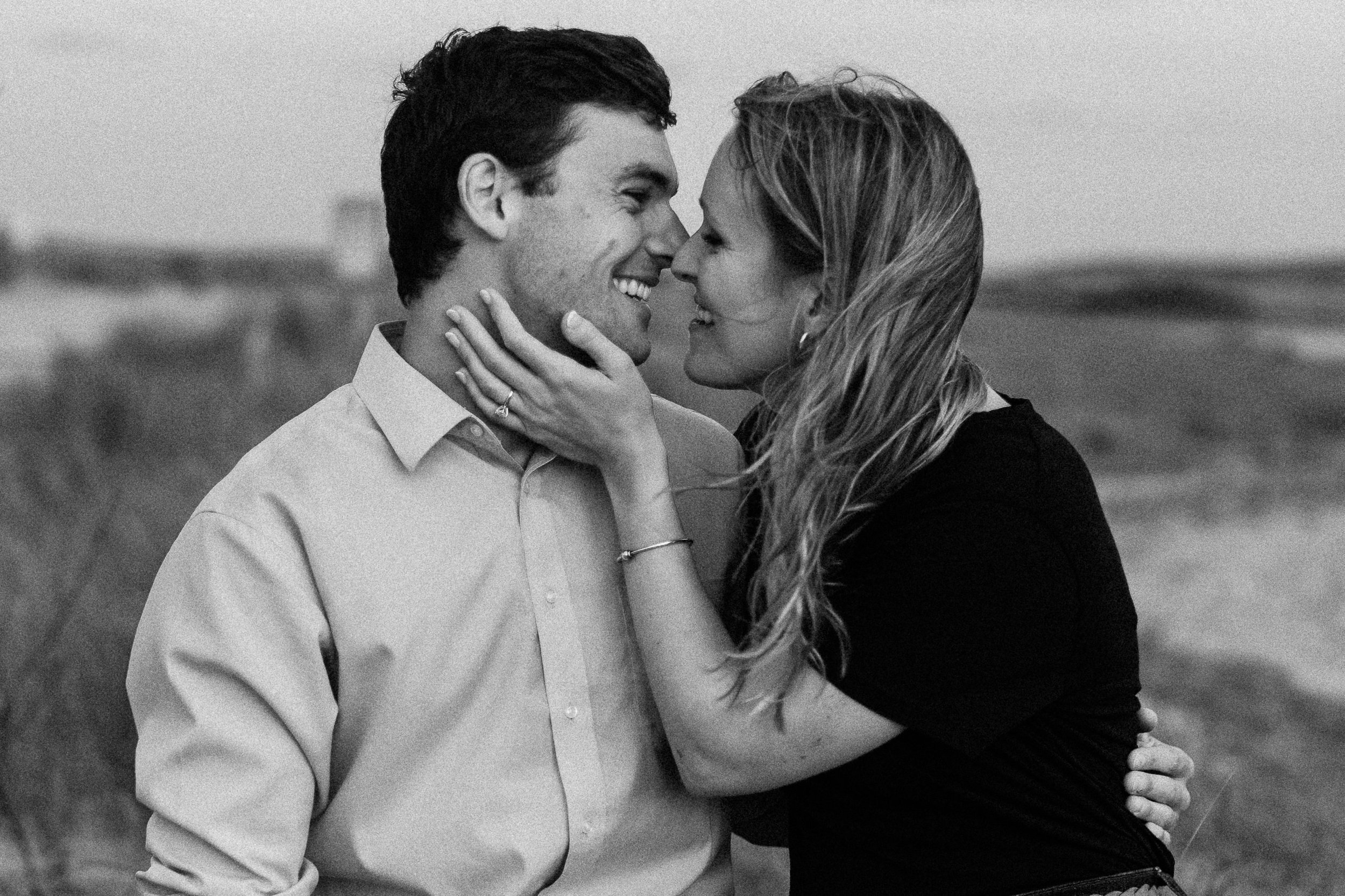 Playful Duxbury Beach Engagement — candid wedding moment