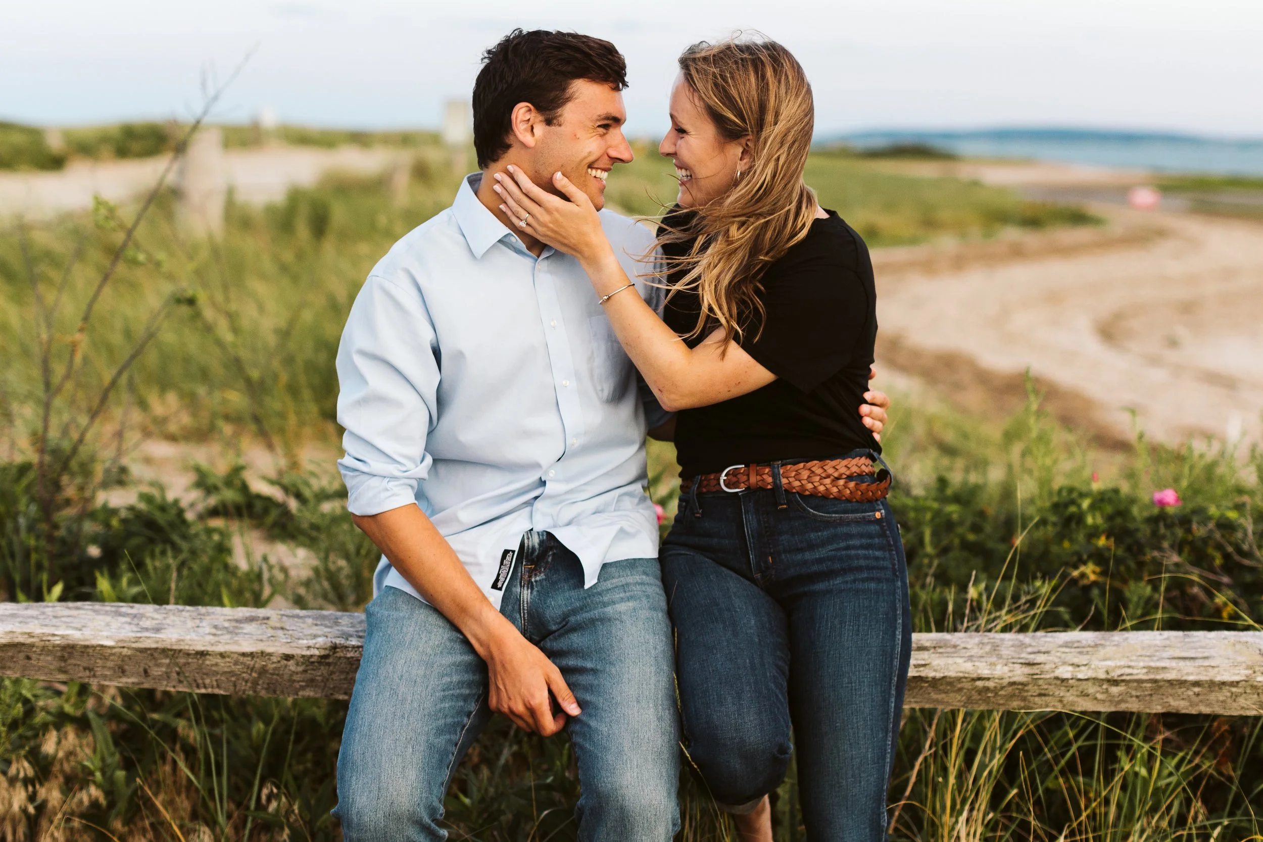 Playful Duxbury Beach Engagement — candid wedding moment