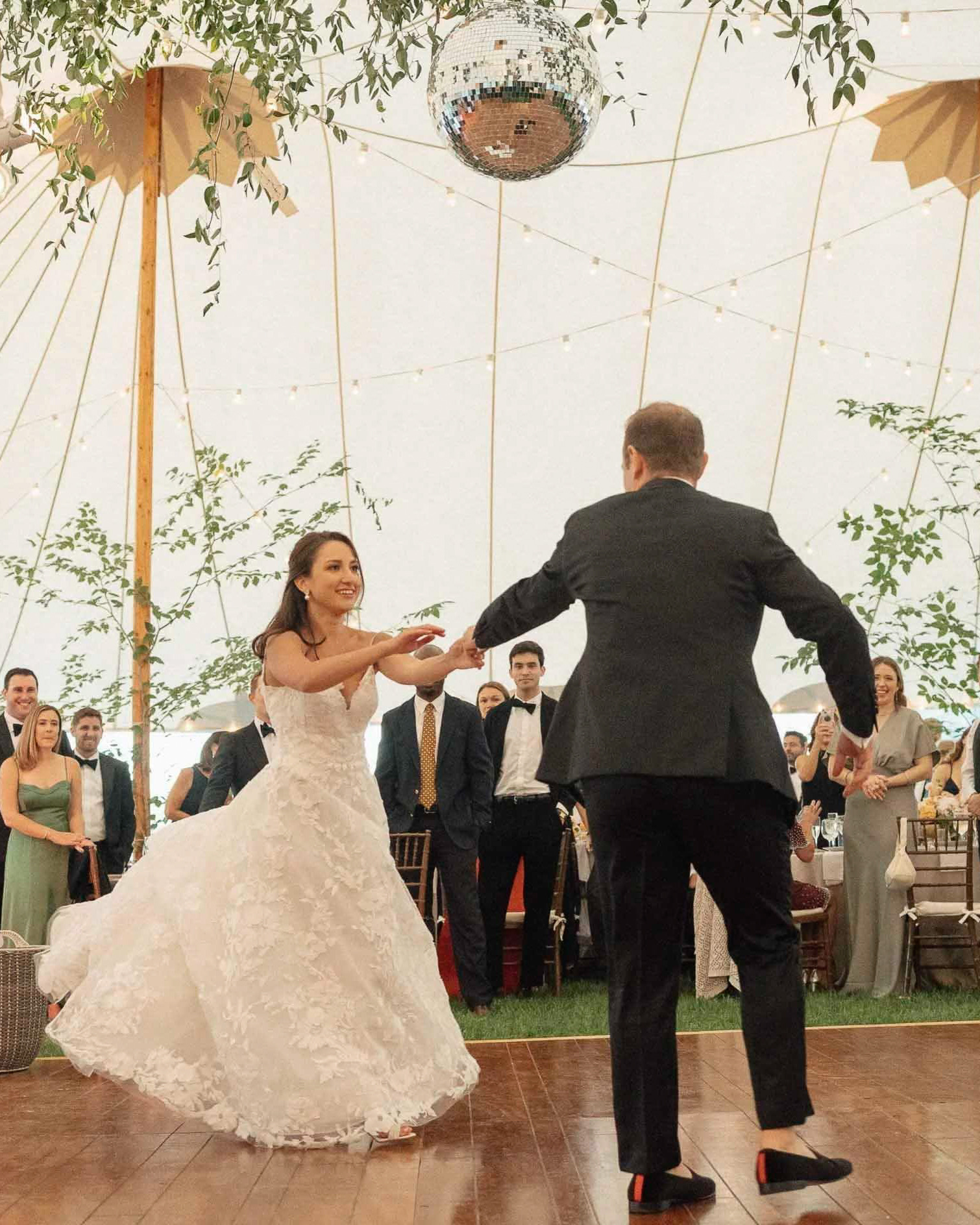A first dance under a sailcloth tent at Moraine Farm in Beverly