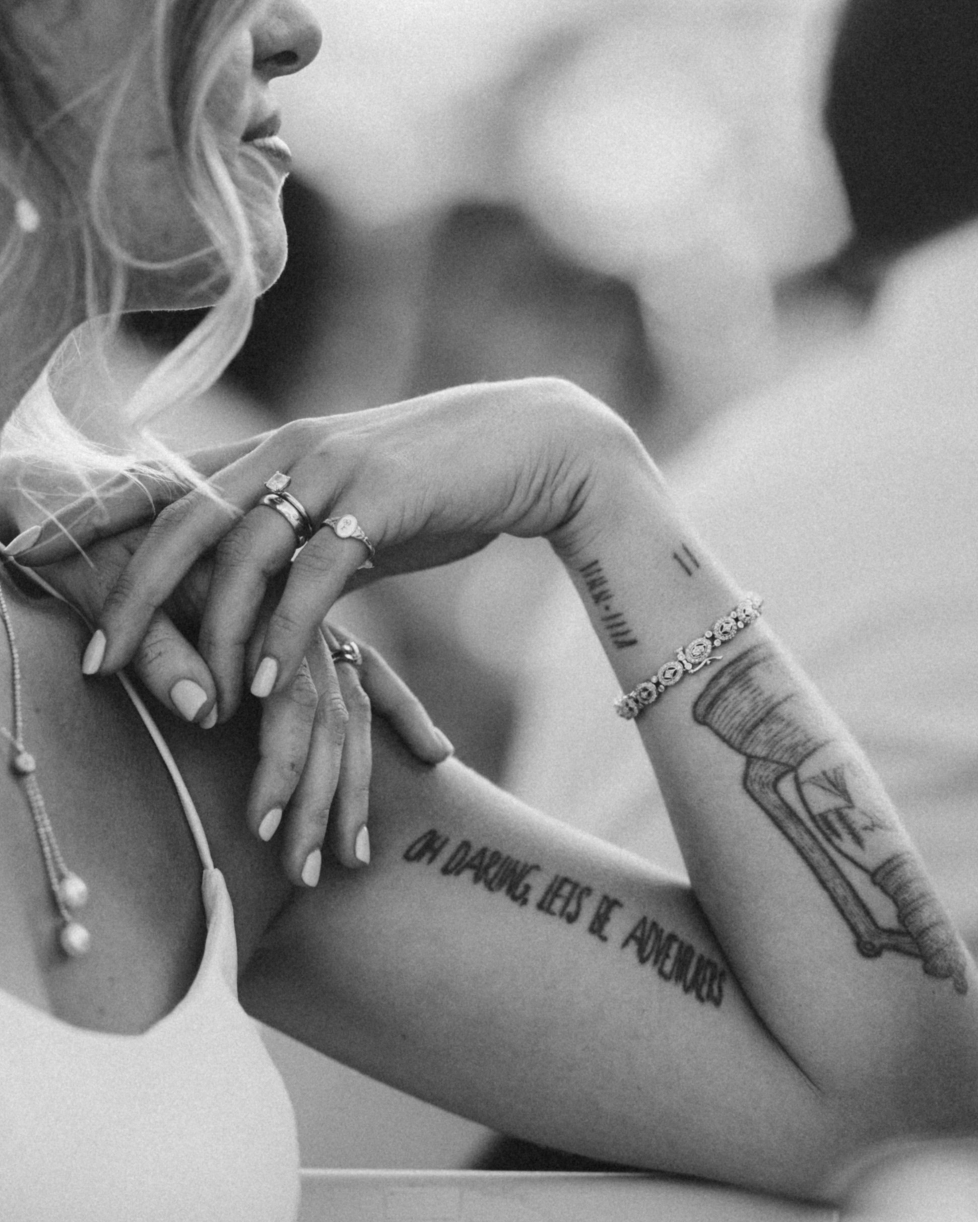A bride adjusts her earring before a private estate wedding on the North Shore