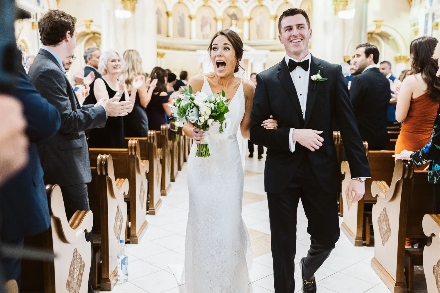 St Leonard of Port Maurice Parish Boston MA — candid wedding moment