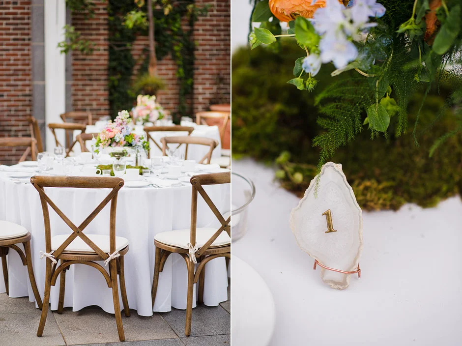 A round table with crossback chairs and a moss-and-floral centerpiece, and a close-up of a table number card at a Tower Hill Botanic Garden wedding