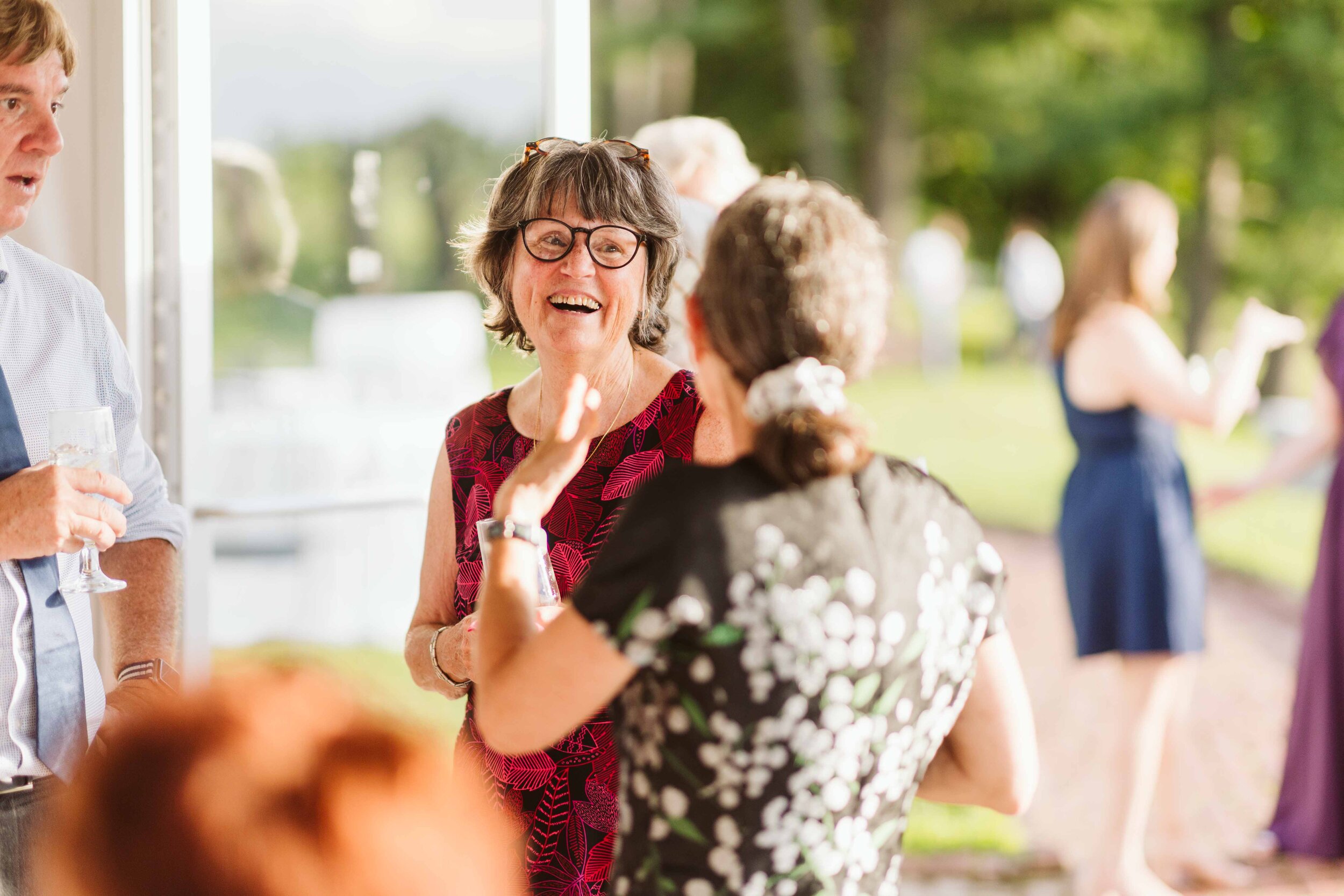 Fruitland Museum in Harvard MA — candid wedding moment